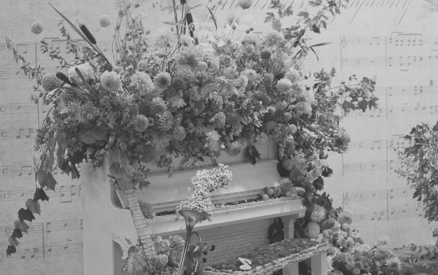 Students collaborating on game development projects in modern classroom setting